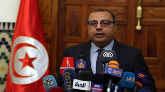 epa08629136 Tunisian Prime Minister-designate Hichem Mechichi speaks to media after his meeting with the ministers he has chosen to form the new government in Carthage, Tunis, Tunisia, 27 August 2020. The new government, which will be presented to the Assembly of People's Representatives in a plenary vote of confidence, is made up of 28 members including 25 ministers and three secretaries of state. EPA/MOHAMED MESSARA