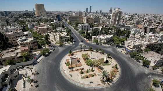This picture taken on August 28, 2020 shows a view of an empty roundabout during a COVID-19 coronavirus pandemic curfew in the centre of Jordan's capital Amman. - Jordan on August 28 started imposing a full curfew in Amman and Zarqa, 23 kilometres north-east of the capital, after a hike in the number of coronavirus cases. The country also cancelled the 2020 edition of the annual Jerash Festival of Culture and Arts. (Photo by Khalil MAZRAAWI / AFP) (Photo by KHALIL MAZRAAWI/AFP via Getty Images)