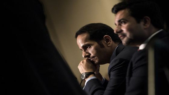 Qatar's Foreign Minister Mohammed bin Abdulrahman al-Thani (L) and Qatar's Ambassador to the United States Meshal bin Hamad Al Thani listen during a luncheon hosted by the Arab Center of Washington, DC on June 29, 2017 in Washington, DC. / AFP PHOTO / Brendan Smialowski