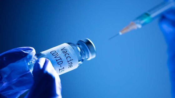 This picture taken on November 17, 2020 shows a syringe and a bottle reading "Vaccine Covid-19". - According to the World Health Organization, some 42 "candidate vaccines" against the novel coronavirus Covid-19 are undergoing clinical trials on November 17, 2020. (Photo by JOEL SAGET / AFP)
