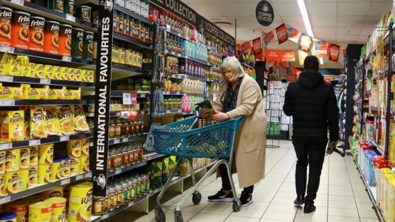 A woman uses a trolley as she shops at a grocery store in East London, in the Eastern Cape province, South Africa, July 7, 2022. REUTERS/Siphiwe Sibeko