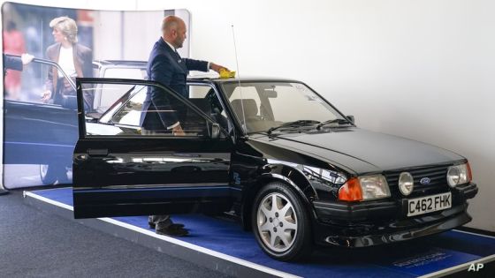 The Ford Escort RS Turbo Series 1, that belonged to the late Diana, Princess of Wales, is seen during a preview of an auction at Silverstone circuit, in Northamptonshire, England, Friday, Aug. 26, 2022. The Ford Escort RS Turbo was driven by Diana, Princess of Wales from 1985 until 1988 and goes on auction for the first time, on the year that marks the 25th anniversary of her death, on Aug. 31, 1997. (AP Photo/Alberto Pezzali)