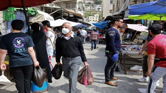 Residents shop at a market ahead of the Muslim holy month of Ramadan, during the novel coronavirus pandemic crisis in the Jordanian capital Amman, on April 23, 2020. (Photo by Khalil MAZRAAWI / AFP) (Photo by KHALIL MAZRAAWI/AFP via Getty Images)