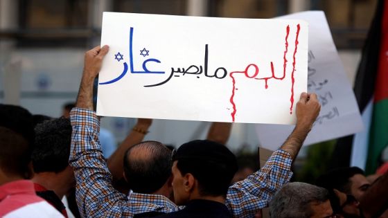 AMMAN, JORDAN - OCTOBER 21: A group of Jordanian stage a protest against the natural gas deal with Israel, outside the National Electric Power Company building in Sweifieh district of Amman, Jordan on October 21, 2016. (Photo by Salah Malkawi/Anadolu Agency/Getty Images)