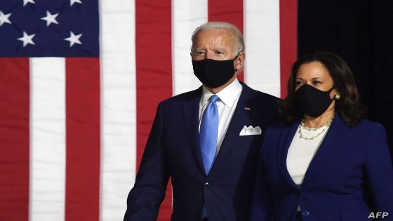 Democratic presidential nominee and former US Vice President Joe Biden (L) and vice presidential running mate, US Senator Kamala Harris, arrive to conduct their first press conference together in Wilmington, Delaware, on August 12, 2020. (Photo by Olivier DOULIERY / AFP)