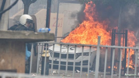 A car burns after NATO Kosovo Force (KFOR) soldiers clashed with local Kosovo Serb protesters at the entrance of the municipality office, in the town of Zvecan, Kosovo, May 29, 2023. REUTERS/Laura Hasani