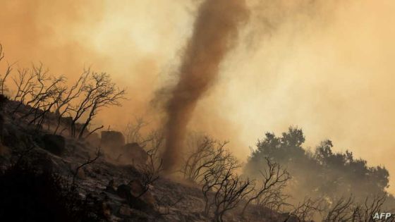 FILE PHOTO: A whirlwind of hot ash and embers moves through a wildfire, dubbed the Cave Fire, burning in the hills of Santa Barbara, California, U.S., November 26, 2019. REUTERS/David McNew/File Photo