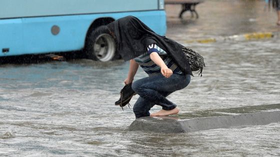 ISTANBUL, TURKEY - JULY 19 : Heavy rainfall affects the life negatively in Istanbul's Uskudar square, Turkey on July 19, 2014. Torrential rain has caused flash flooding in Istanbul since early Saturday, prompting road closures and disrupting life across parts of the city. (Photo by Yakup Cabuk/Anadolu Agency/Getty Images)