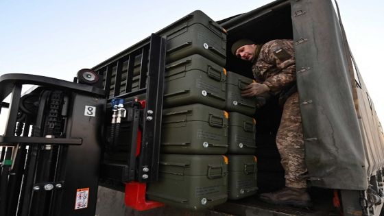 Servicemen of Ukrainian Military Forces move US made FIM-92 Stinger missiles, a man-portable air-defence system (MANPADS), that operates as an infrared homing surface-to-air missile (SAM), and the other military assistance shipped from Lithuania to Boryspil Airport in Kyiv on February 13, 2022. - Ukrainian leader Volodymyr Zelensky will speak to US President Joe Biden "in the coming hours", his office said on February 13, 2022, as Western fears grow that Russia is about to invade the ex-Soviet state. The talks come one day after the White House reported there had been no breakthrough during a one-hour phone conversation between Biden and Russian President Vladimir Putin. (Photo by Sergei SUPINSKY / AFP)