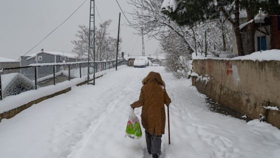 A local resident walks in the snow in the Maltepe district in Istanbul on January 24, 2022. (Photo by Yasin AKGUL / AFP) (Photo by YASIN AKGUL/AFP via Getty Images)