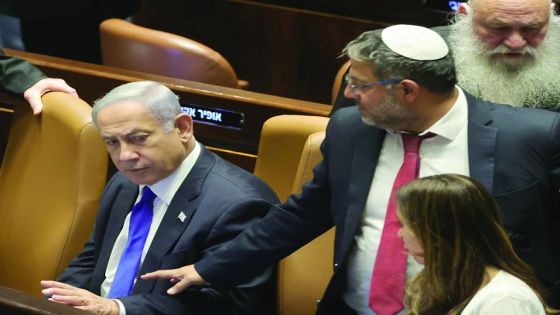 epa10766202 Israeli Minister of National Security Itamar Ben-Gvir (C) speaks with Israeli Prime Minister Benjamin Netanyahu (L) during a session at the Knesset to vote on law on justice system reform, Israel, 24 July 2023. Mass protests continue across the country as the Israeli parliament, or Knesset, is set to hold a final vote on the bill that would limit the Supreme Court's powers. EPA/ABIR SULTAN