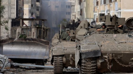 Israeli tanks operate in Gaza City, amid the ongoing ground operation of the Israeli army against Palestinian Islamist group Hamas, in the Gaza Strip, November 22, 2023. REUTERS/Ronen Zvulun EDITOR'S NOTE: REUTERS PHOTOGRAPHS WERE REVIEWED BY THE IDF AS PART OF THE CONDITIONS OF THE EMBED. NO PHOTOS WERE REMOVED.