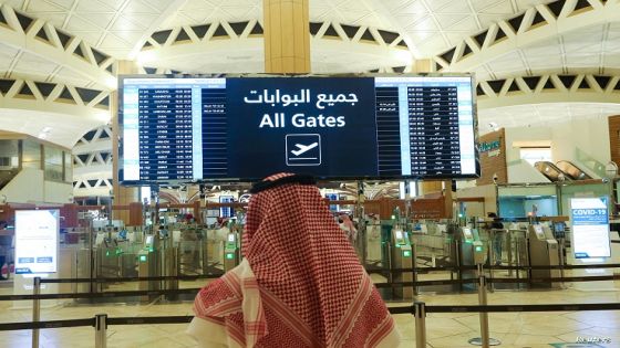 A Saudi man checks the flight timings at the King Khalid International Airport, after Saudi authorities lifted the travel ban on its citizens after fourteen months due to coronavirus disease (COVID-19) restrictions, in Riyadh, Saudi Arabia, May 16, 2021. REUTERS/Ahmed Yosri