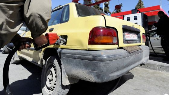 A man fills the tank of a car at a petrol station in Damascus, Syria , February 19, 2017. Picture taken February 19, 2017. REUTERS/Omar Sanadiki